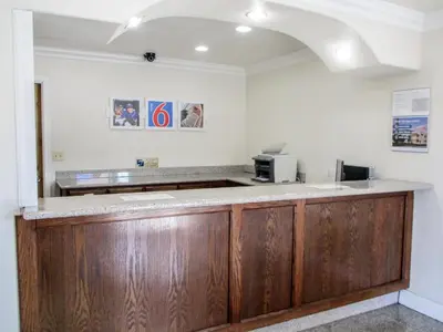 a kitchen with a counter with a microwave at Motel 6-Fresno, CA in Fresno