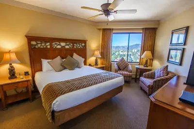 a hotel room with a bed and a window at Holiday Inn Club Vacations - Tahoe Ridge Resort in Stateline