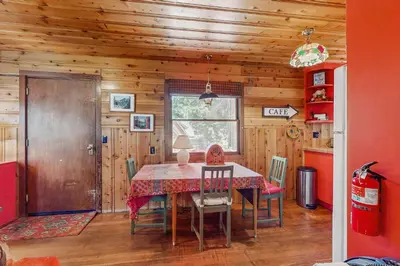 a dining room with a table and chairs at The Cherry Leaf Lodge & Retreat on Fallen Leaf Lake in Fallen Leaf