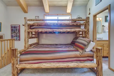 a bedroom with a bunk bed in a house at Val D'Isere 45 in Mammoth Lakes