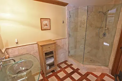 a bathroom with a shower and a glass shower stall at Silver Bear # 36 in Mammoth Lakes