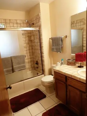 a bathroom with a toilet and a shower and a sink at NEW CHARMING 2 BEDROOMS UNIT CLOSE TO EVERYTHING in Oakhurst