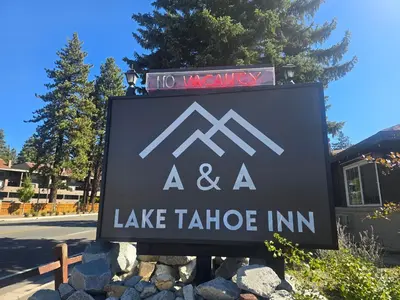 a sign for a lake tahoe inn at A&A Lake Tahoe Inn in South Lake Tahoe