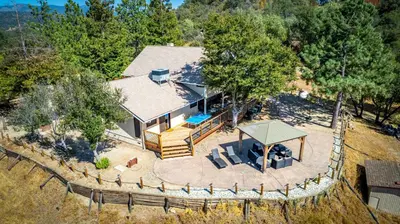 an overhead view of a house with a fence at Mountain View Playhouse Near Yosemite & Bass Lake in Oakhurst