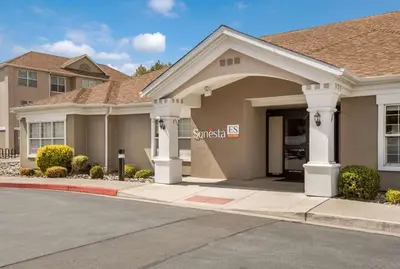 a house with a garage in front of it at Sonesta ES Suites Reno in Reno