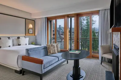a hotel room with a bed and a couch at The Ritz-Carlton, Lake Tahoe in Truckee