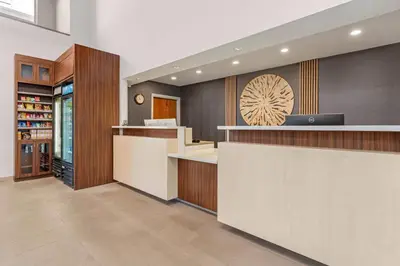 a kitchen with a counter and a counter top at Country Inn & Suites by Radisson, Modesto-Salida in Modesto