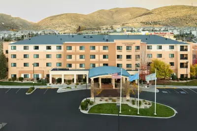an aerial view of a hotel with mountains in the background at Courtyard Carson City in Carson City