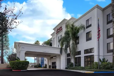 a rendering of the front of a hotel at Hampton Inn & Suites Tulare in Tulare