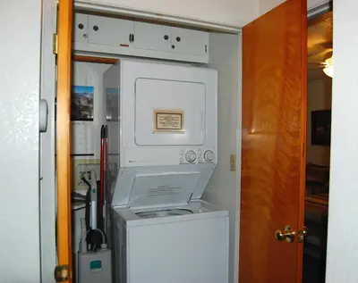 a white washer and dryer in a room at 23A Big Cedar in Wawona