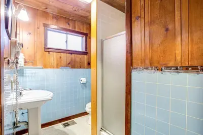 a bathroom with a toilet and a sink and a shower at 50R Soots-Me in Wawona