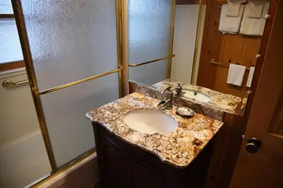a bathroom with a sink and a shower at 79 Half Dome in Wawona