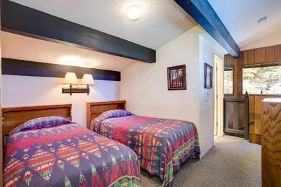 a bedroom with two beds in a room at 15B The Legacy in Wawona