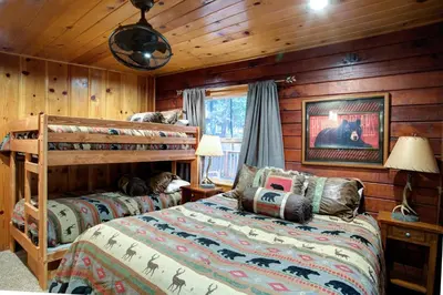 a bedroom with two bunk beds in a cabin at 74 Our Yosemite Getaway in Wawona