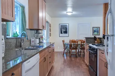 a kitchen with a sink and a stove top oven at 81 Ashbaugh Meadow in North Wawona