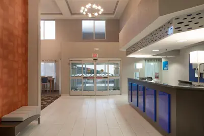 a lobby of a hospital with a waiting room at Holiday Inn Express Rocklin - Galleria Area by IHG in Rocklin