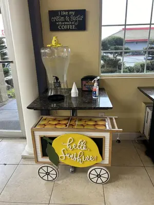 a food cart with a blender on top of it at Days Inn by Wyndham Turlock in Turlock