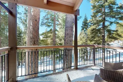 a screened in porch with a view of trees at Indian Hills Hideaway in Ponderosa Fairway Estates