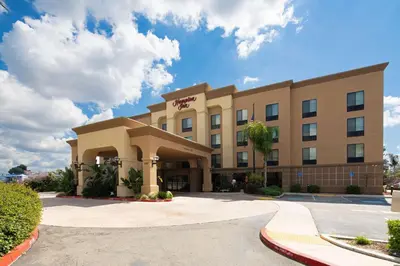 a rendering of a hotel with a building at Hampton Inn Visalia in Visalia