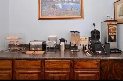 a kitchen counter with appliances on top of it at Americas Best Value Inn - Carson City in Carson City