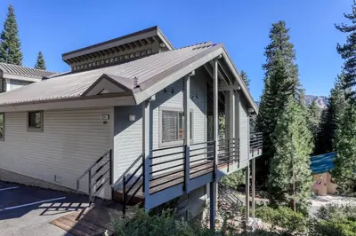 a house with a porch and a roof at Eagle's Landing Condo 68 in Lakeshore