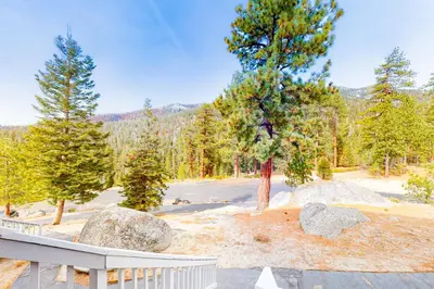 a view of a park with trees and rocks at Eagle's Landing Condo 78 in Lakeshore