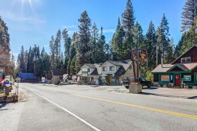 an empty road in a small town with houses at Huntington Lake Condo 92 in Lakeshore