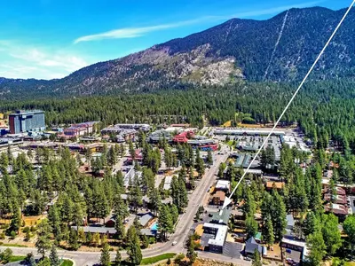 an aerial view of a town with a mountain at Heavenly Inn Lake Tahoe in South Lake Tahoe