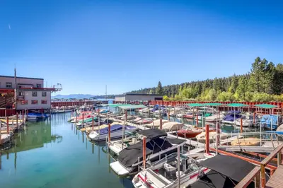 a bunch of boats docked in a harbor at Tahoe City Retreat in Lake Forest