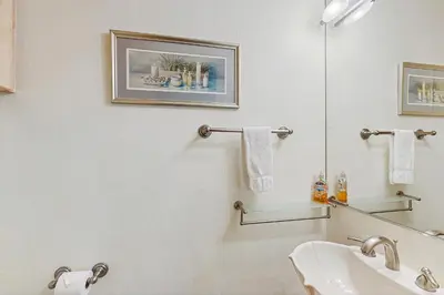 a bathroom with a sink and a mirror at Brockway Springs #36 in Kings Beach