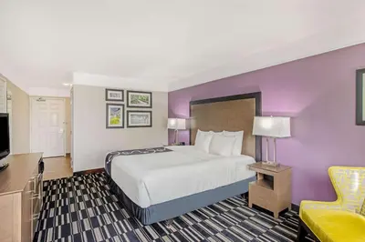 a hotel room with a bed and a tv at La Quinta by Wyndham Modesto Salida in Modesto