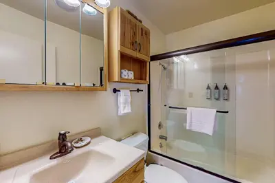 a bathroom with a shower and a sink and a toilet at Everness Dawn Retreat* in Mevers