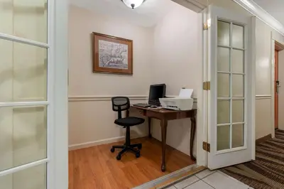 an office with a desk with a computer on it at Best Western Colonial Inn in Selma