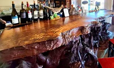 a bar with a bunch of bottles of wine at Panamint Springs Motel & Tents in Panamint Springs