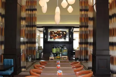 a conference room with a long table and chairs at Hilton Garden Inn Clovis in Clovis