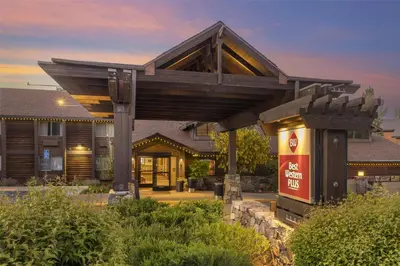 a building with a sign in front of it at Best Western Plus Truckee-Tahoe Hotel in Truckee