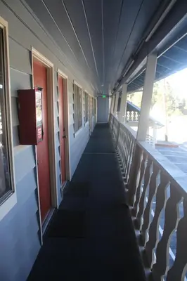 a hallway of a school building with a long aisle at Thunderchief Inn in South Lake Tahoe