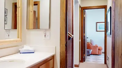a bathroom with a sink and a mirror at Mammoth West #140 Condo in Mammoth Lakes