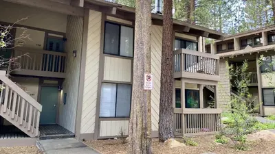 a building with a no parking sign in front of it at Horizons 4 #188 Condo in Mammoth Lakes