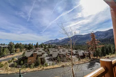 a view of a town in the mountains from a balcony at Sunstone #109 Condo in Mammoth Lakes
