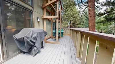a front porch of a house with a tent at Chateau De Montagne #42 Condo in Mammoth Lakes
