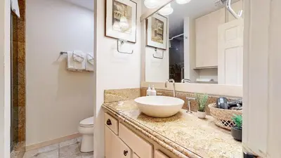 a bathroom with a sink and a toilet at Mammoth West #115 Condo in Mammoth Lakes