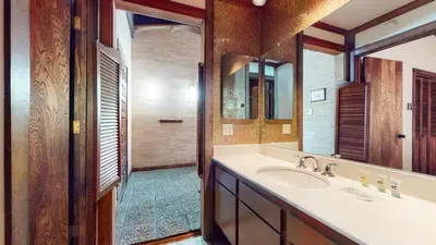 a bathroom with a sink and a mirror at Mammoth West #124 Condo in Mammoth Lakes