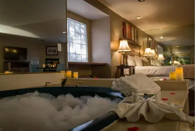 a bathroom with a bath tub with clouds in it at Postmarc Hotel and Spa Suites in South Lake Tahoe