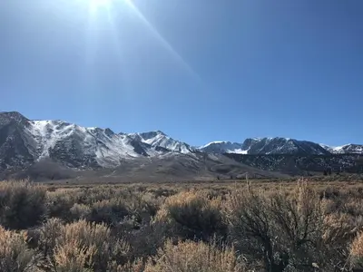 a view of the snowy mountains in the desert at Mountainback 45 Den in Mammoth Lakes