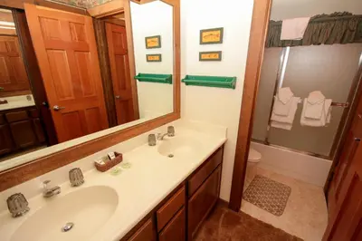 a bathroom with a sink and a mirror at Mountainback 34 Corner in Mammoth Lakes