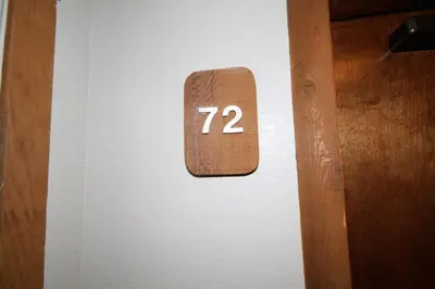a clock on a wall with the number on it at Mountainback 72 Corner Unit in Mammoth Lakes