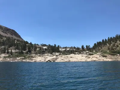 a view of a lake with trees on a mountain at Mountainback 53 Loft in Mammoth Lakes
