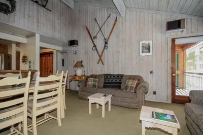 a living room with a couch and a table at Mountainback 12 2 Bdrm 3 Ba Loft - Pet Ok in Mammoth Lakes