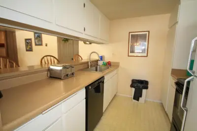a kitchen with a sink and a counter top at Discovery 4 125 in Mammoth Lakes